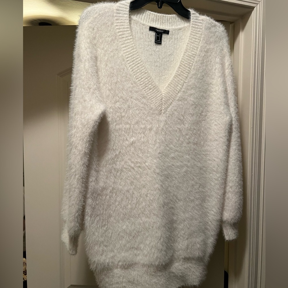 Forever 21 small white sweater fits like a larger medium.